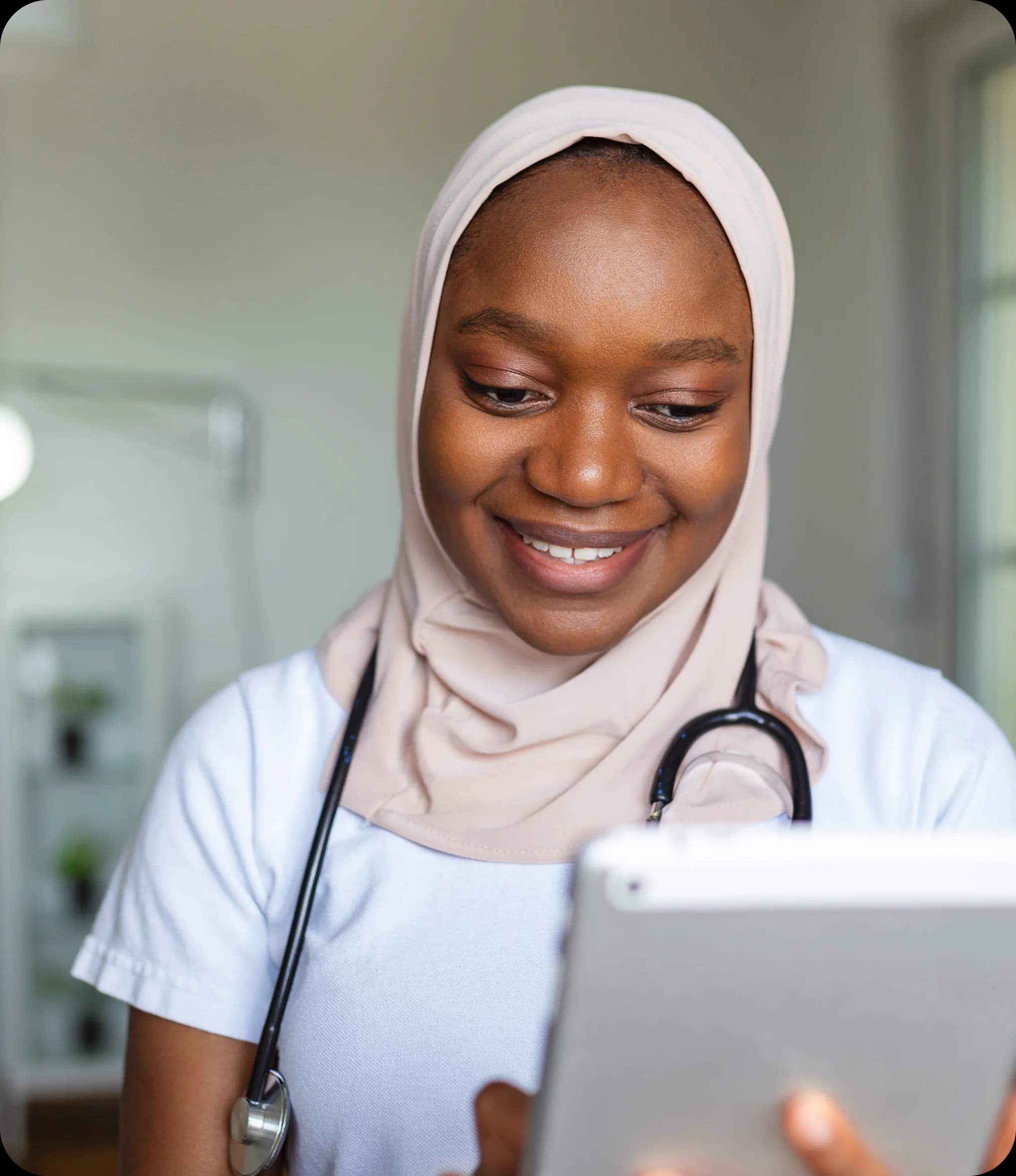 Mental healthcare provider reviewing tablet