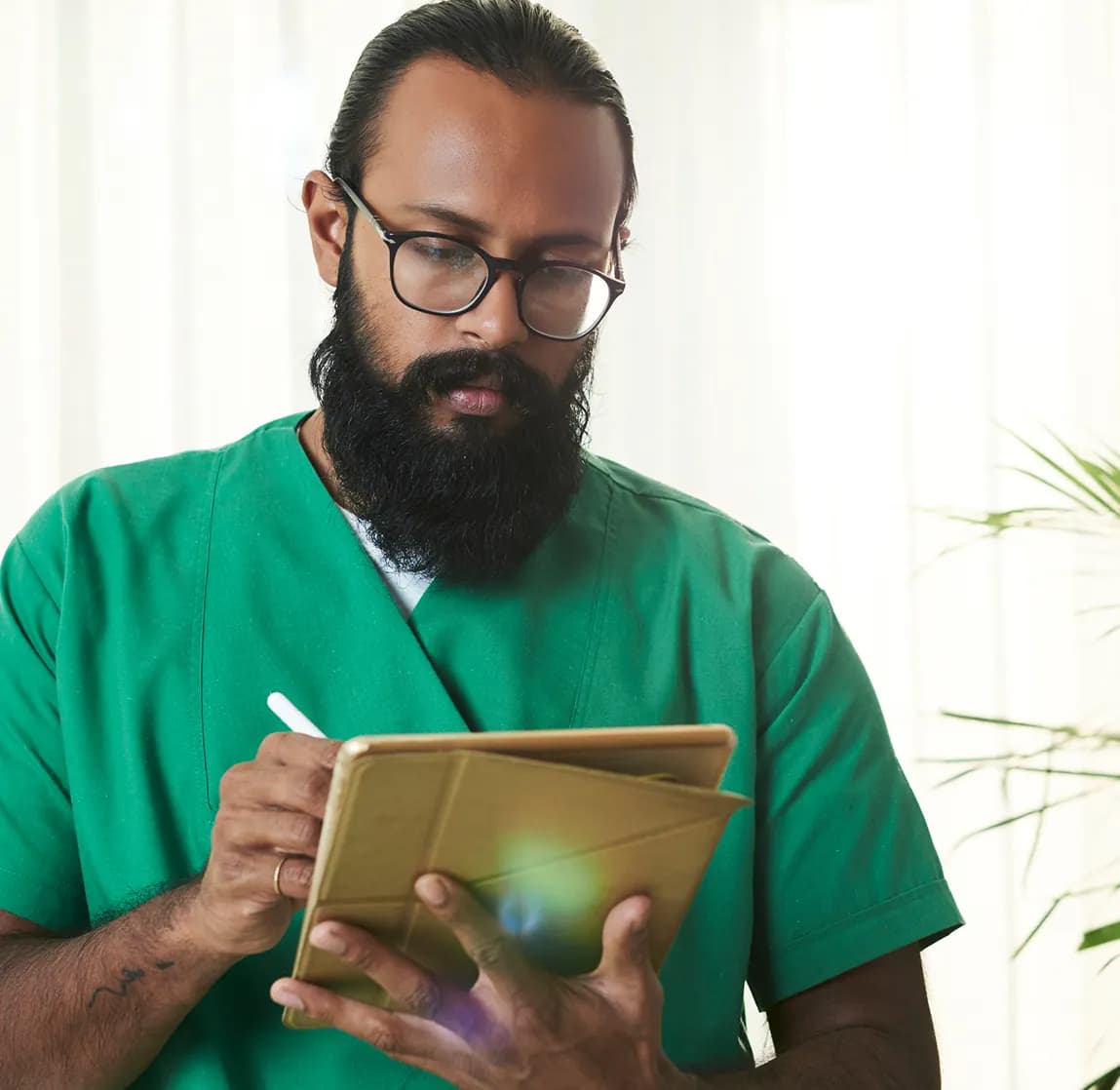 Healthcare professional using a tablet