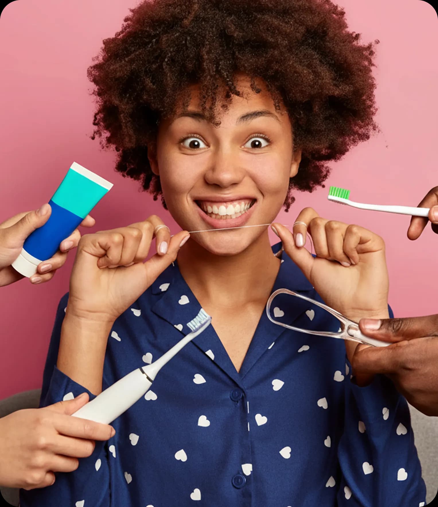 Smiling woman with dental care products